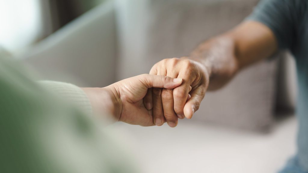 patient and caregiver hands