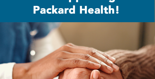 Thank you to the Community Foundation for Southeast Michigan for supporting Packard Health. Image show a medical provider holding the hand of an elderly patient.