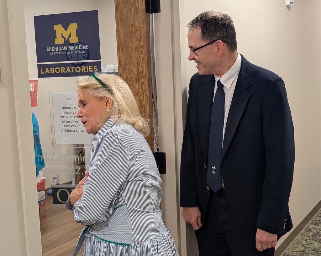 Rep. Dingell and Packard Health ED Ray Rion looking into MLabs office