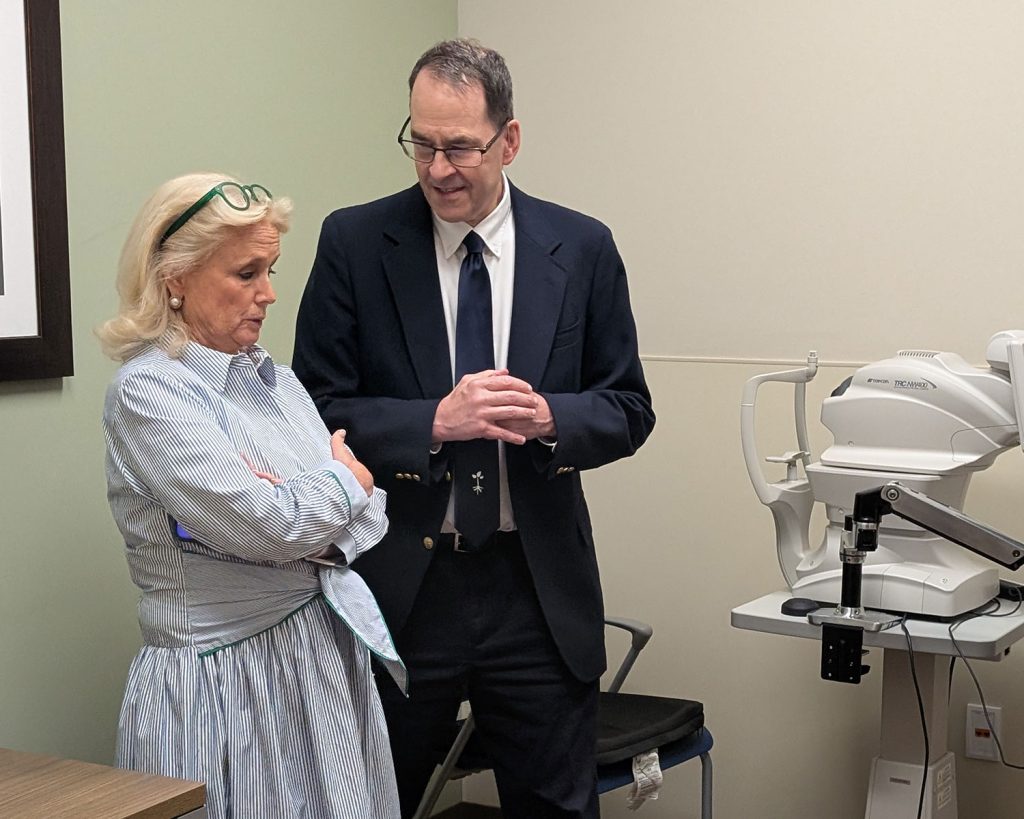 Rep. Dingell speaking with Packard Health ED Ray Rion